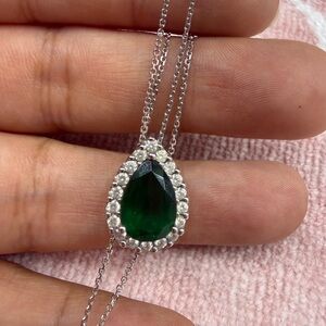 14k white gold emerald pear cut necklace with diamonds